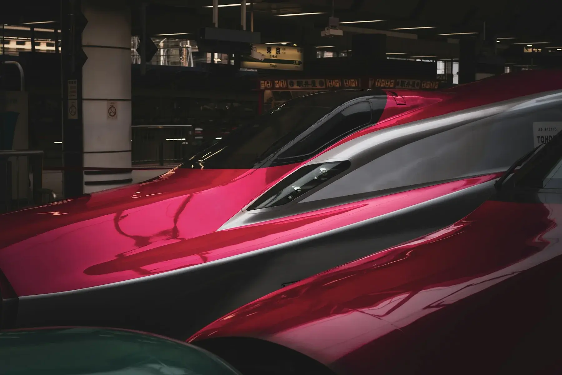 A Shinkansen bullet train at a station platform