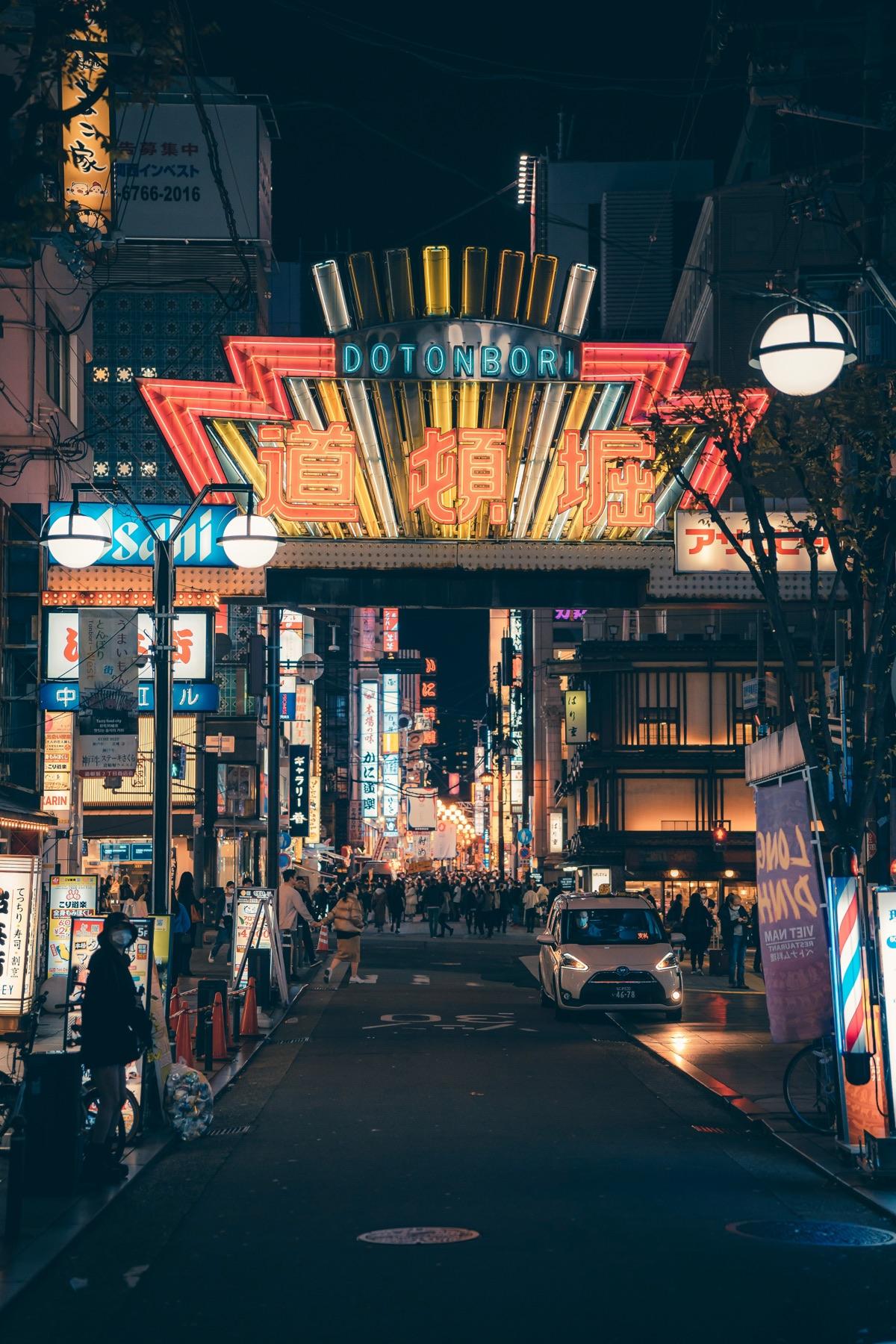 Dotonbori entrance glowing at night in Osaka